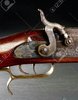 61032885-old-black-powder-cap-and-ball-double-trigger-rifle-.jpg