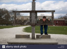a-teenage-boy-pretends-to-be-locked-in-the-stockade-at-colonial-williamsburg-BB5AD6.jpg